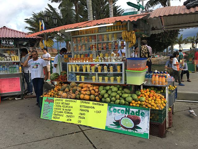A smoothie stand with fruit in a Farmer's Market in Quindio, Colombia